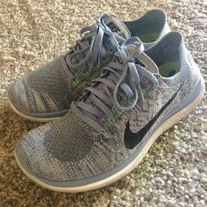 Navy Blue Nike Flyknit Running Shoes